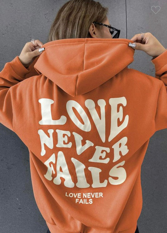 "Love Never Fails" Graphic Hoodie